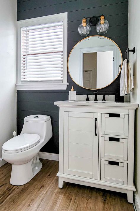 An easy small bathroom remodel with charchoal shiplap featured wall, white vanity and a 2-light fixture. Powder Room Remodel, Small Bathroom Vanities, Small Vanity, Small Bathroom Makeover, White Vanity Bathroom, White Vanity, Downstairs Bathroom, Basement Bathroom, Upstairs Bathrooms