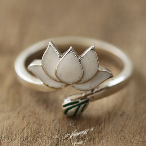 Indian designer Sapna Mehta draws inspiration from lotus flowers to create a charming accessory for the everyday. Crafted by local artisans, this sterling silver wrap ring comes in a polished finish and features a lotus bloom, symbolizing resilience and rebirth. Lotus Flower Ring, Lotus Ring, Wood Dangle Earrings, Lotus Jewelry, Silver Wrap Ring, Platinum Wedding Rings, Sterling Silver Cat, Lotus Flowers, Diy Coasters