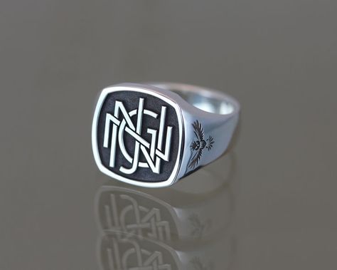 Monogram designed using four letters 3D laser engraving on a sterling silver signet ring, with personalised shoulder engraving. Signet Rings, Silver Signet Ring, 3d Laser, Monogram Design, Signet Ring, Laser Engraving, Class Ring, Monogram, Sterling Silver