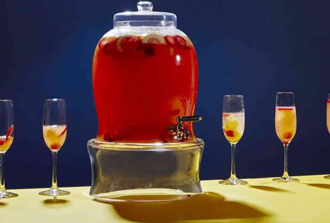 Best Jungle Juice Recipe - Thrillist Red Jungle Juice, Best Jungle Juice Recipe, Party Punch Alcohol, Jungle Juice Recipe, Strawberry Liqueur, Leftover Halloween Candy, Frozen Grapes, Jungle Juice, Canned Pineapple