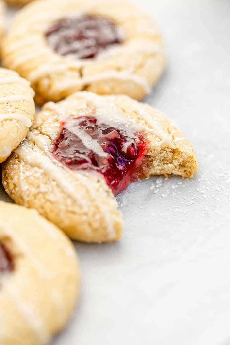 Vegan Thumbprint Cookies - Eat With Clarity Shortbread Thumbprint Cookies, Raspberry Thumbprint, Raspberry Thumbprint Cookies, Almond Shortbread, Smores Dessert, Best Christmas Cookie Recipe, Thumbprint Cookies Recipe, Easy Christmas Cookie Recipes, Holiday Cookie Exchange