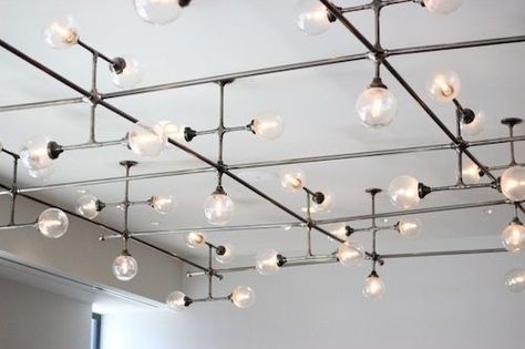 Another example of sprawling conduit light fixture. Industrial Track Lighting, Deco Luminaire, Plafond Design, Pipe Lighting, Lighting Plan, Kitchen Lighting Fixtures, Lampe Design, Luminaire Design, Light Architecture