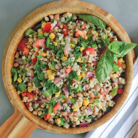 Pearled barley, black eyed peas and plenty of fresh chopped veggies are at the heart of this light and refreshing summer barley salad. It's perfect for a no cook summer side dish and is a popular salad for potlucks, picnics and backyard cookouts. Cold Barley Salad Recipes, Barley Edamame Salad, Cold Barley Salad, Pearl Barley Salad Recipes, Barley Salad Recipes, Apple Cider Dressing, Pearl Barley Salad, Cider Dressing, Pearled Barley