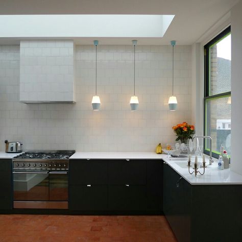 Kitchen with dark units and reclaimed quarry tiles By Georgina Mann www.mosleyandmann.co.uk Minimal Kitchen Design, Modern Contemporary Kitchen, Dark Grey Kitchen, Quarry Tiles, Terracotta Floor, Minimal Kitchen, Dark Kitchen, Tile Kitchen, Contemporary Kitchen Design