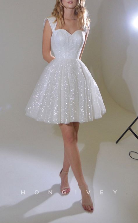 Look stunning in this ornate and sexy A-Line Empire Sweetheart Fully Sequined Short Evening/Party/Homecoming Dress. With its exquisite sequined design, it'll make you the center of attention at any event. Shine with confidence and elegance. Gown Simple, Short White Dress Wedding, Sparkle Fabric, Glitter Prom Dresses, Knee Length Wedding Dress, Sparkly Wedding Dress, Mini Wedding Dresses, Sparkly Wedding, Mini Skirt Dress