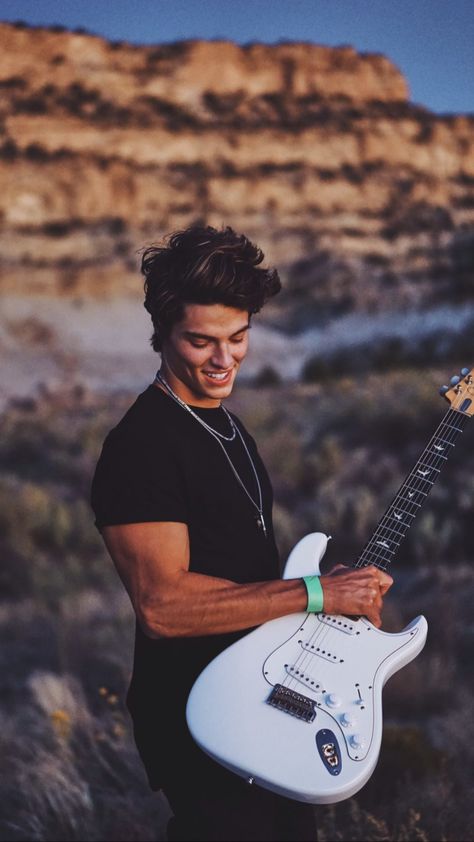 Men Poses With Guitar, Poses With Electric Guitar, Guitar Senior Pictures Boys, Guitar Profile, Guitar Players Photography, Jon Dretto, Guitar Senior Pictures, Guitar Portrait, Sam Larson