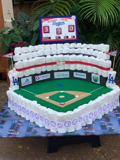 Diaper Cake Baskets, Dodger Baby Shower Ideas, Boy Diaper Cake Ideas, Dodgers Baby Shower Ideas, Creative Diaper Cakes, Baseball Diaper Cake, Disney Diaper Cake, Diaper Jeep, Unique Diaper Cakes