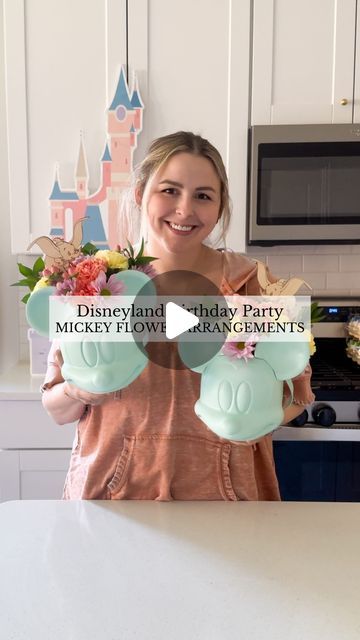 Sierra Miller | Content Creator on Instagram: "Did you guess right?! 👀 So excited to get these on the tables tomorrow and suddenly wishing I did more 🤦🏻‍♀️😂😅  . . . . . . . #disneyparty #disneylandparty #disneylandbirthday #mickeybirthday #mickeymousebirthday #mickeymousebirthdayparty #minniemousebirthday #diypartydecor #flowerarrangement #floralcenterpiece" Subtle Disney Centerpieces, Disney Birthday Party Centerpieces, Vintage Disneyland Centerpiece, Disneyland Theme Centerpieces, Disneyland Centerpieces Birthday, Disneyland Centerpieces, Disney Table Centerpieces, Disneyland Theme Birthday Party, Disneyland Birthday Party Theme