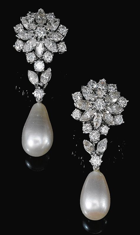 FINE PAIR OF NATURAL PEARL AND DIAMOND EARRINGS, 1960S. Of floral design, each surmount set with marquise-shaped and brilliant-cut diamonds, suspending a drop-shaped natural pearl measuring approximately 10.4 x 10.5 x 17.4mm and 9.75 x 10.0 x 15.8mm respectively, butterfly and post fittings. Pearl And Diamond Earrings, Natural Pearl, Fabulous Jewelry, Gorgeous Jewelry, Tahiti, Natural Pearls, Diamond Earrings Studs, Modern Jewelry, Diamond Pendant