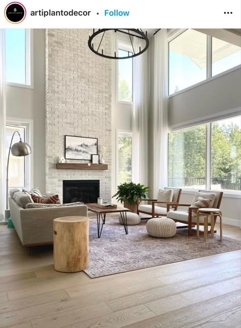 High Ceiling Sitting Room Ideas, Fireplace Stone Floor To Ceiling, Small Living Room Tall Ceilings, High Ceiling Living Room Windows, High Peak Ceiling Living Room, Tall Fireplace Wall High Ceilings Tile, Tall Fireplace Living Room, Living Room High Ceilings Big Windows, High Ceiling Chimney Ideas