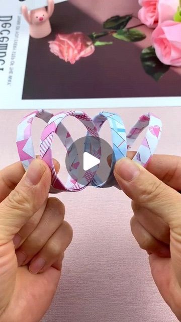 paper crafts creator on Instagram: "Title: "Bestie Bracelet: Handmade DIY for Friendship Fun!"
Hashtags: #HandmadeDIY #FriendshipBracelet #CraftingTutorial #QuickLearning #PaperFoldingTutorial" How To Make Paper Bracelets, Friendship Bands Diy, Handmade Friendship Band, Friendship Bands, Friendship Band, Paper Bracelet, Paper Folding Crafts, Girly Art Illustrations, April 6