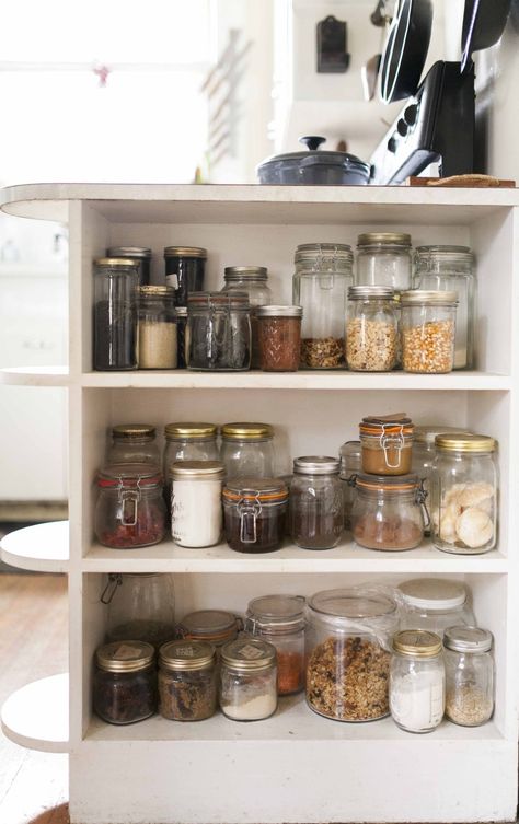 Mason jars are inherently useful — especially in the kitchen. Mason jars get a lot of attention in the DIY space, but have you ever tried using mason jars for your kitchen organization? This form of housekeeping will create more valuable storage for your kitchen.  Here are eight ways to lean on these household staples to keep your kitchen in order. Ikea Kitchen Cupboards, Pantry Bugs, Dapur Ikea, Real Kitchen, Organisation Hacks, Storage Racks, Organization Inspiration, Ikea Storage, Apartment Kitchen