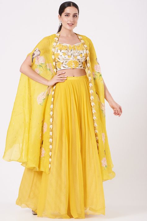 Featuring a yellow cape in organza base with digital print. It is paired with a matching raw silk embroidered blouse and pleated palazzo pants.  FIT: Fitted at bust and waist. COMPOSITION: Raw silk, Organza. CARE: Dry clean only. Palazzo Pants Indian, Pleated Palazzo Pants, Palazzo Dress, Cape Set, Palazzo Pant, New Address, Pants Fit, Indian Clothes, Cap Dress