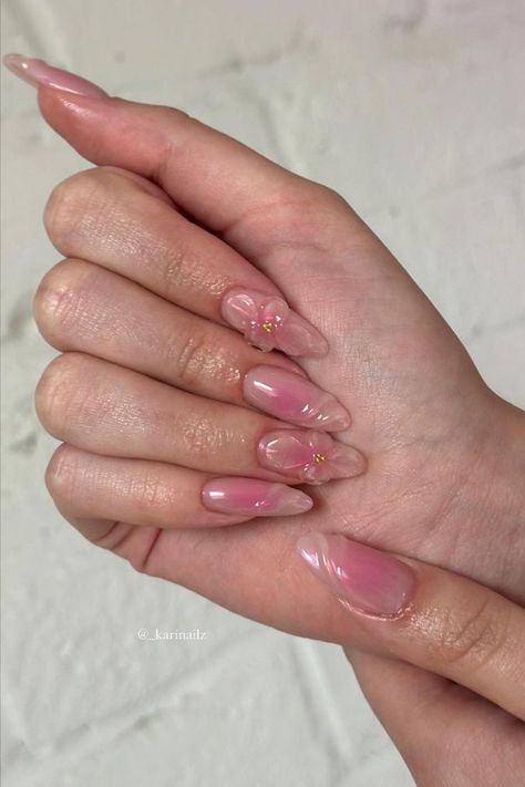 These neutral pink nails by @_karinailz (IG) feature a soft pink aura in the center, enhanced with clear 3D patterns. A touch of gold beads adds a subtle, elegant sparkle that elevates the design. Dive into the magical world of aura nails with these 25 captivating designs that are trending right now. From holographic to elegant, find the perfect nail art ideas at Nailustrous to express your style. Neutral Pink Nails, Aura Nail Designs, Aura Nail, Gold Gel Nails, Blush Pink Nails, Elegant Touch Nails, Soft Pink Nails, Aura Nails, Neutral Pink