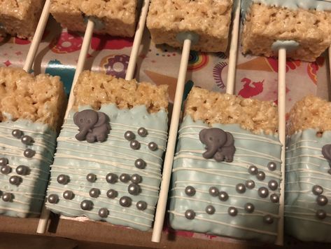 Elephant theme chocolate covered rice krispy treats Elephant Rice Krispie Treats, Gender Reveal Treats, Elephant Food, Baby Shower Snacks, Graduation Party Cake, Elephant Baby Shower Decorations, Elephant Baby Shower Theme, Elephant Shower, Krispy Treats