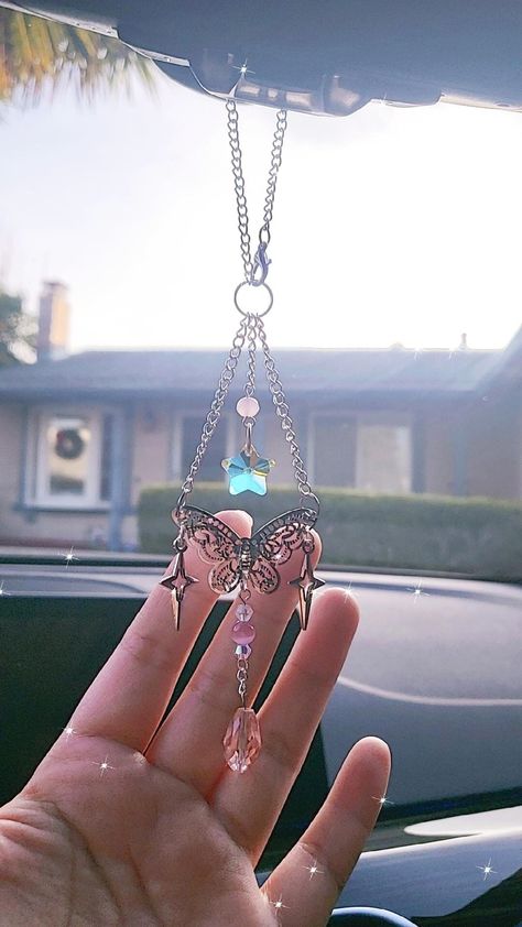 This Beautiful Charm is made carefully from start to finish!🙂 It can be used as a car hanging or to decorate the wall or window. Also, can be a good gift!💕 Dangling Silver Star pendants look so cute and Crystal Teardrops & star will shine beautifully in the sun🌈☀️ ✨2 Design Options A ( with Pink Teardrop ) B ( with Rose quartz & Clear Teardrops ) Also, Rose Quartz is known as a healing stone😊 It promotes love, self-love and feeling of peace. ❤Feel free to contact us if you have any questions Car Crystals Rear View Mirror, Car Hanging Accessories Crystal, Crystal Rearview Mirror Decoration, Cute Car Ornaments, Review Mirror Car Decorations, Diy Car Mirror Hangers, Hanging Butterfly Decorations, Car Dangles, Car Rear View Mirror Decor