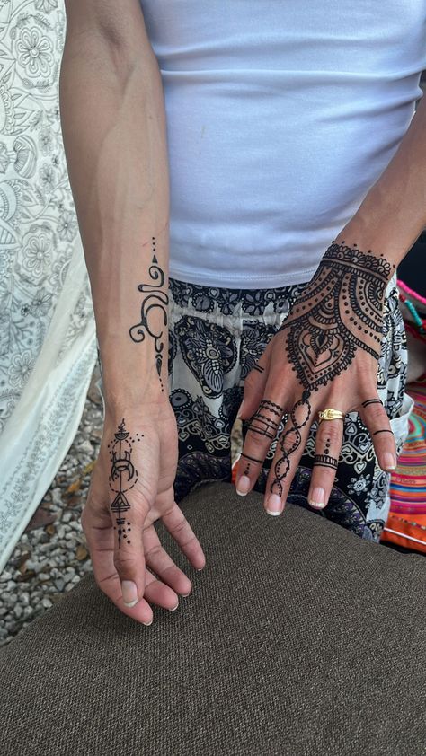 Two hands with henna. One hand has a detailed design and the other has a design ok the thumb and the wrist has a breathe symbol. Mehndi Designs For Man Hand, Mehndi Hand Tattoo, Men’s Henna Hand, Henna Designs Men Hand, Henna Men Designs, Henna Designs Guys, Male Henna Designs Hand, Henna For Men Hands, Man Henna Designs