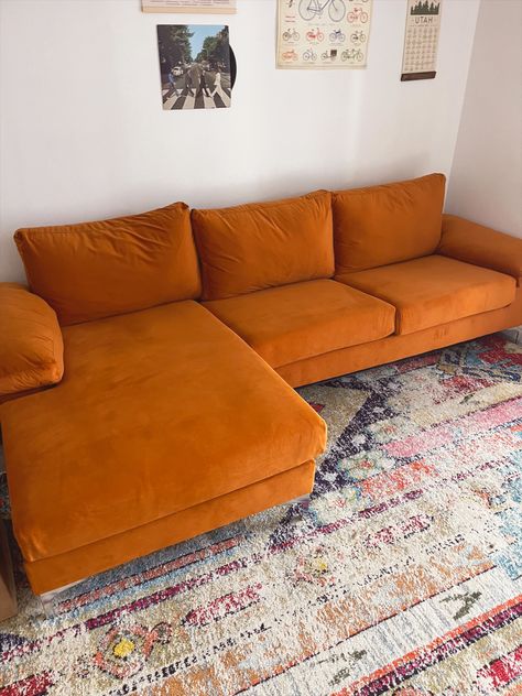 Orange couch styled, green velvet couch Mid Century Modern L Shaped Couch, Orange L Shape Sofa, L Shape Sofa Orange, Orange Retro Couch, 70s Style Couch, Courdory Couch, Orange Couch Decor, Groovy Couch, Cute Couches Living Room