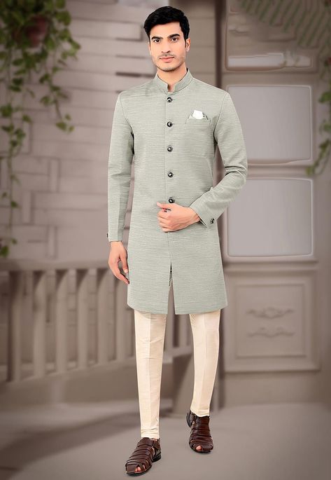 Readymade Terry Rayon Jacquard Sherwani in Grey This Collar Neck and Full Sleeve attire is Allured with Buttons and Pockets Available with an Art Dupion Silk Pant in Cream Do note: Footwear shown in the image is for presentation purposes only. Half to one inch may vary in measurement. (Slight variation in actual color vs. image is possible) Black Indo Western Dress, Sherwani Pakistani, Menswear Kurta, Western Dress For Men, Indo Western Dress For Men, Mens Indo Western, Grey Kurta, Mens Sherwani, Modest Evening Dress