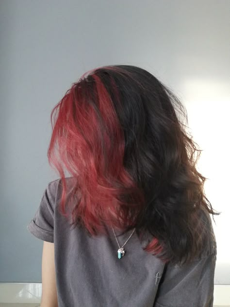 Girl sitting with face turned away from camera showing wavy red and dark brown hair Red Front Pieces Of Hair, Dyed Front Hair, Half Red Half Brown Hair, Red And Brown Hair Ideas, Red Streak In Brown Hair, Front Hair Dyed, Brown Hair Red Tips, Red Hair Highlights On Brown Hair, Brown Hair With Red Underneath