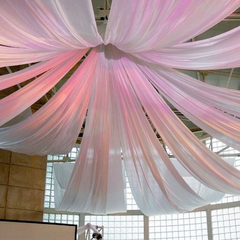 hanging fabric from ceiling ideas | Decorating with Sheer Fabrics - J Fabrics Store Newsletter Blog Tulle Ceiling Draping, Tulle Ceiling, Wedding Reception Rooms, Blush Wedding Decor, Wedding Ceiling, Barn Loft, Dance Decorations, Fabric Ceiling, Ceiling Draping