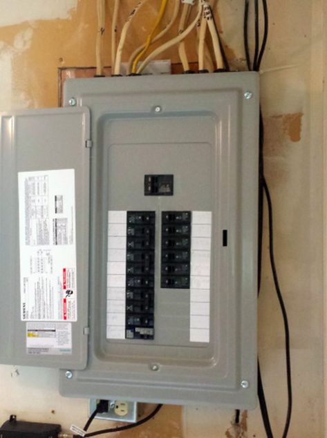 When indexing your panel, identify the breakers with numbers and write the circuit descriptions in pencil. Affix the index to the back of the panel door. Electrical Breakers, Breaker Panel, Breaker Box, House Repair, Wire Diy, Electrical Panel, Panel Door, The Breakers, Diy Cans