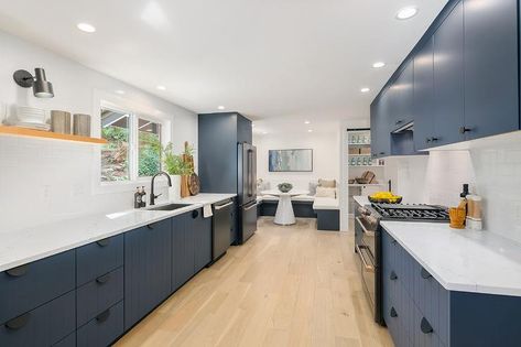 Plank Kitchen Cabinets, Blue Cabinets Black Hardware, Kitchen Island Finishes, Modern Treehouse, Gray Quartz Countertops, Gray Shaker Cabinets, White Counter Stools, Top Kitchen Cabinets, Blue Kitchen Island