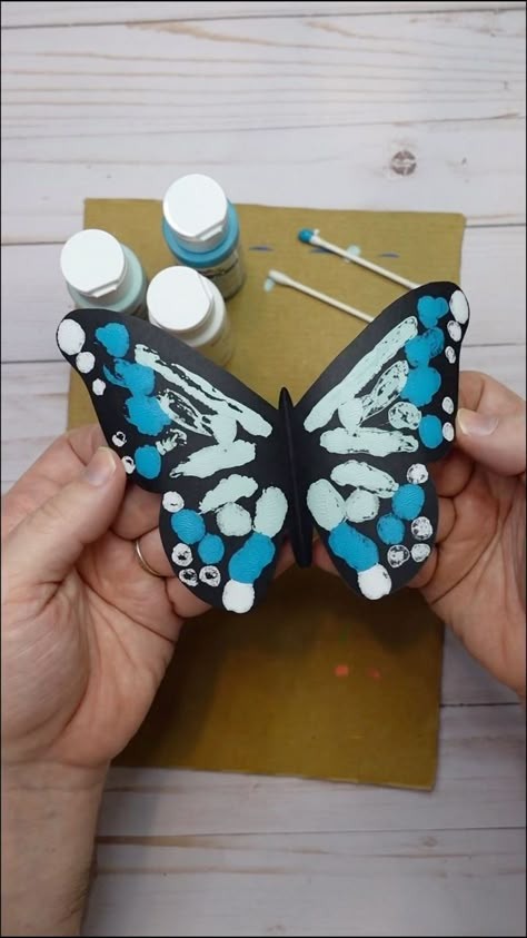 Squish painting butterfly wings is a really fun and easy art activity for little kids. The art technique is called squish painting because you paint squish paint around on a folded piece of paper, then open it up to reveal beautiful butterfly wings! Easy butterfly craft ideas for kids. Supplies: Butterfly Outline Black Paper or Cardstock Acrylic Paint Cotton Swabs or Q-tips Scissors #butterfly #kidsart #easycrafts #paint #kidsactivities #papercraft | Timm Sevitz | Timm Sevitz · Original audio Squish Painting, Tk Crafts, Easy Butterfly Craft, Butterfly Painting Easy, Butterfly Craft Ideas, Paper Squish, Butterfly Lifecycle, Simple Art Activity, How To Make Butterfly