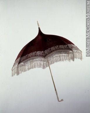 Printed silk parasol with white fringe on carved ivory handle, slight pagoda shape, late 1860's-early 1870's Fancy Umbrella, 1830s Fashion, Victorian Accessories, Umbrellas Parasols, Empire Style, Vintage Purses, Historical Costume, Historical Clothing, Historical Fashion