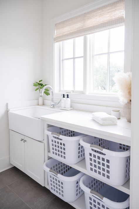 Laundry Room Baskets Storage, Laundry Room With Laundry Basket Storage, Laundry Room With Sorting Baskets, Laundry Basket Storage In Small Laundry Room, Laundry Room Open Under Counter, Laundry Room Clothes Basket Ideas, Laundry Room Basket Shelf, U Shaped Laundry Room, Laundry Room With Basket Storage