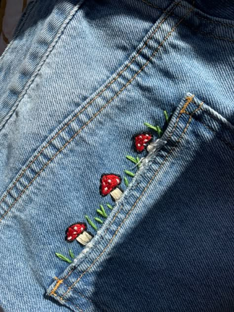 toadstool embroidery with grass Embroidery Designs On Jeans, Embrodiary Design, Personalized Jeans, Customised Jeans, Embroidery Jeans Diy, Clothes Embroidery Diy, Fairy Clothes, Diy Embroidery Patterns, Embroidery On Clothes