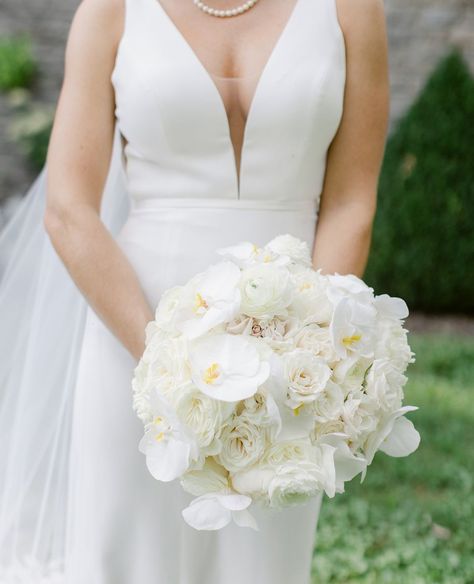 Floral V Designs on Instagram: “Danyel choose a timeless bridal bouquet of white and Ivory roses, garden roses and white phael orchids. ⁠ ⁠ @greenacresfoundation⁠…” Rose And Orchid Bouquet, Garden Rose Bouquet, Orchid Bouquet, Bridal Bouquet Flowers, Roses Garden, Ivory Roses, White Wedding Bouquets, White Wedding Flowers, Ivory Flowers