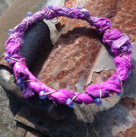 Cherry and Purple Pansies Silk Sari and Czech glass by vowangems Silk Bangles, Bracelet With Charms, Copper Crafts, Coil Bracelet, Fabric Bracelets, Silk Jewelry, Recycled Sari Silk, Purple Pansy, Memory Wire Bracelet