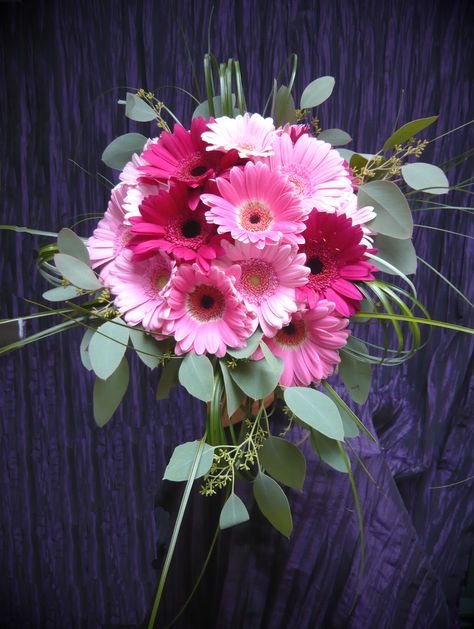 The bride's bouquet of pink gerber daisies, seeded eucalyptus and bear grass tied with garden twine by Emil J Nagengast Florist, Albany, NY. Gerber Daisy Eucalyptus Bouquet, Eucalyptus Bouquet, Gerber Daisy, Bride's Bouquet, Gerber Daisies, Seeded Eucalyptus, Albany Ny, Bride Bouquets, Twine