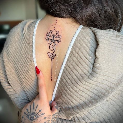 Lotus Tattoos For Women Back, Meaningful Lotus Tattoos For Women, Neck Spine Tattoos For Women, Lotus Flower Tattoo Side Ribs, Lotus Flower Spine Tattoos For Women, Lotus Flower Tattoo Women, Lotus Flower Tattoo Spine, Lotus Spine Tattoos For Women, Small Lotus Tattoos For Women