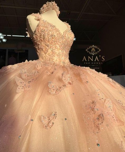 Quincenera Dresses Champagne Pink, Pink And Gold Xv Dress, Pink Blush Quinceanera Dress, Pink Quince Dress With Butterflies, Peach Quince Dress, Pastel Pink Quince Dresses, Quince Dresses With Butterflies, Quince Dresses Butterfly, Rose Quinceanera Dresses