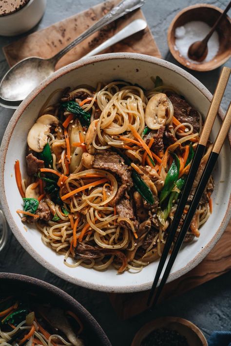 Japchae (Korean Sweet Potato Noodles) | Make japchae at home for a comforting, delicious, and nutritionally balanced weekday dinner. The tender sweet potato noodles are tossed with charred beef and crispy veggies in a sweet savory sauce. This easy recipe uses shortcuts to make the cooking process faster than the traditional recipe. {Gluten Free adaptable, vegan adaptable} Korean Sweet Potato Noodles, Kimchi Chicken, Tasty Noodles Recipe, Crispy Veggies, Koreansk Mat, Korean Sweet Potato, Potato Noodles, Asian Noodle Recipes, Mapo Tofu