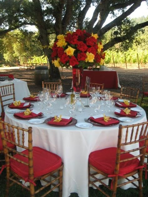 Loved the drama of the red along with yellow and red roses centerpieces.      http://www.a-dreamwedding.com/ Red Sunflower Wedding, Red Roses And Sunflowers, Roses Centerpieces, Red Roses Centerpieces, Yellow Wedding Decorations, Rose Wedding Theme, Sunflower Wedding Decorations, Red Wedding Decorations, Sunflower Centerpieces