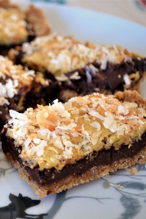 Looking for dessert recipes? Try baking these chocolate coconut bar cookies. Use chocolate chips and sweetened coconut to bake these easy dessert bars for a dessert recipe. Coconut Bar, Coconut Chocolate Bars, Chocolate Chip Bars, Coconut Desserts, Coconut Bars, No Bake Bars, Coconut Cookies, Bar Cookies, Cookie Bar Recipes