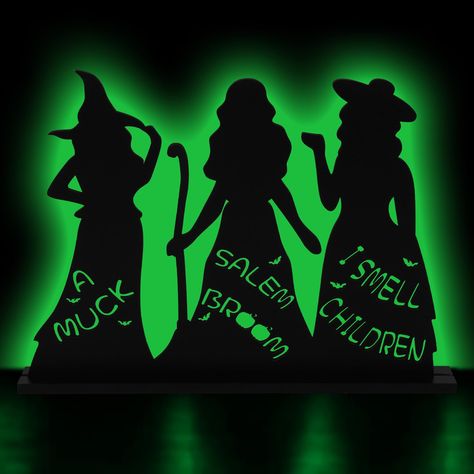 PRICES MAY VARY. Quality Material: This hocus pocus halloween decor are made of quality wood, which are reliable and sturdy enough for you to use for a long time, not easy to deform. Detailed Dimensions: The wood witches size 13.4 inches * 10.2 inches, the rectangle base is 14 inches *1.57 inches. Suitable for decorating various places to enhance halloween atmosphere. Unique Design: Our Witch Halloween wood Tabletop with black silhouettes theme, with the hollow words "A MUCK", "SALEM BROOM", and Witches Table, Witch Centerpiece, Hocus Pocus Sign, Hocus Pocus Halloween Decor, Indoor Halloween Decor, Wooden Table Decor, Black Witches, Wooden Centerpieces, Halloween Party Decoration