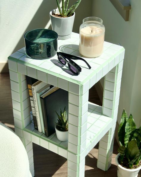 Handmade + hand tiled side table with shelf This product is carefully made involving many tedious steps to ensure quality. This table can be used as a side table, bookshelf, plant stand, or to add a pop of color to your space + many more! This table can be customized to your liking, grout color is hand mixed to replicate any color you could want. In the photo we used many colors to create a vibrant matcha green. Tiled Nightstand, Bedside Table With Tiles, Mosaic Shelf, Diy Tile Side Table, Tile Top Side Table, Green Tile Table, Green Tile Side Table, Tile Furniture, Tile Table