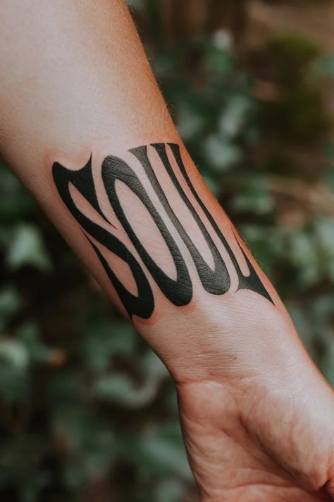 Tattoo on forearm with the word "soul" in bold, black lettering. Wrist Tattoos For Women Meaningful, Small Wrist Tattoo Ideas, Women Tattoo Inspiration, Meaningful Writing, Writing Designs, Small Wrist Tattoo, Tattoos For Women Meaningful, Tattoo Ideas For Females, Wrist Tattoo Ideas