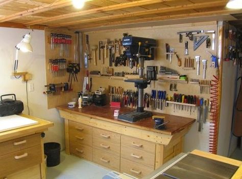 build+a+shop+in+your+basement | Before outfitting your basement as a workshop, bear these ... Island Workbench, Workshop Setup, Officine In Garage, Basement Workshop, Garage Workshop Organization, Workshop Layout, Woodworking Shop Layout, Woodworking Bench Plans, Small Basement