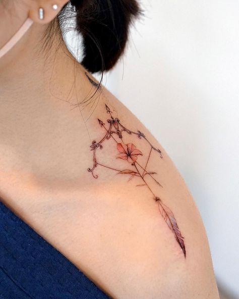 30+ Sagittarius Tattoo Design Ideas for the Seeker Within - Tattoo Inspo Hub Feminine Sagittarius Tattoo, Shoulder Tattoos For Women Meaningful, Sagittarius Flower, Sagittarius Constellation Tattoo, Sagittarius Tattoos, Sagittarius Tattoo Designs, Tattoos For Women Meaningful, Barcode Tattoo, Sagittarius Tattoo