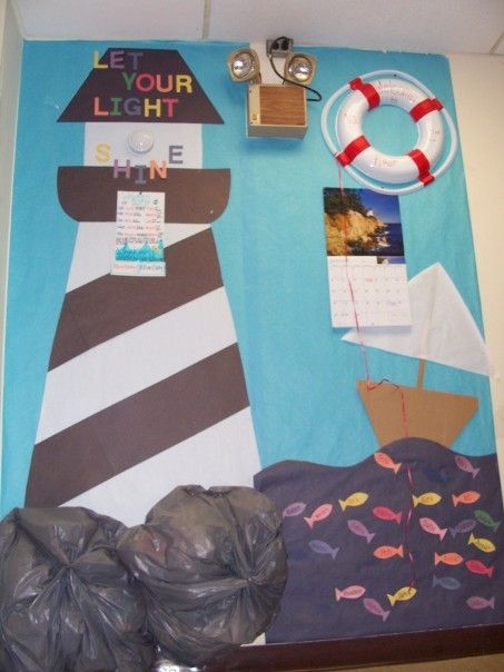 lighthouse theme classroom wall Lighthouse Theme, Nautical Classroom Theme, Nautical Door, Nautical Classroom, Sailing Theme, Ocean Classroom, Ocean Theme Classroom, Sunday School Classroom, Underwater Theme