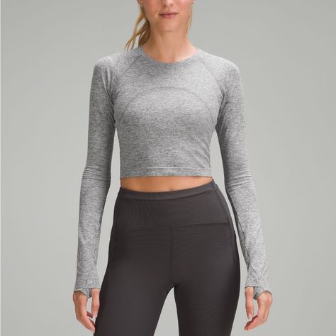 Nwt Size 8 Slate/White Lululemon Swiftly Tech Cropped Long Sleeve Shirt 2.0 Lightweight, Minimal Seams To Reduce Chafe, Mesh Construction For Breathability, Hugs The Body, Runs True To Size; Pairs Well With High Waist Bottoms Lululemon Cropped Long Sleeve, Lululemon Swiftly Tech Long Sleeve Outfit, Cropped Swiftly Tech, Lululemon Shirts & Tops, Lululemon Shirts, Lululemon Swiftly Tech Long Sleeve, Lululemon Shirt, Long Sleeve Workout Top, Lululemon Long Sleeve