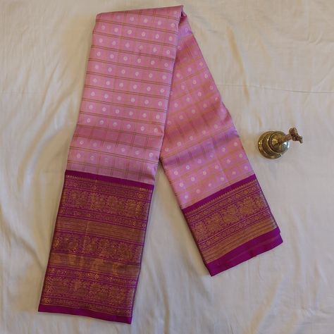 Expertly crafted from pure mulberry silk, this Baby Pink Korvai Kanjeevaram Saree boasts a stunning combination of checks, floral buttis, and a vibrant magenta border. Exuding elegance and grace, this saree is a must-have for any special occasion. With its luxurious fabric and intricate design, you'll feel like a true queen. Saree comes with attached running blouse. Approximate weight: 950 grams All of our saris are handloom saris, made using pure 2g/3g zari and mulberry silk. Note: The colours Pink Saree Combination, Magenta Saree, Asian Attire, Luxurious Fabric, Pink Saree, Wine Colored, Intricate Design, Mulberry Silk, Luxury Fabrics