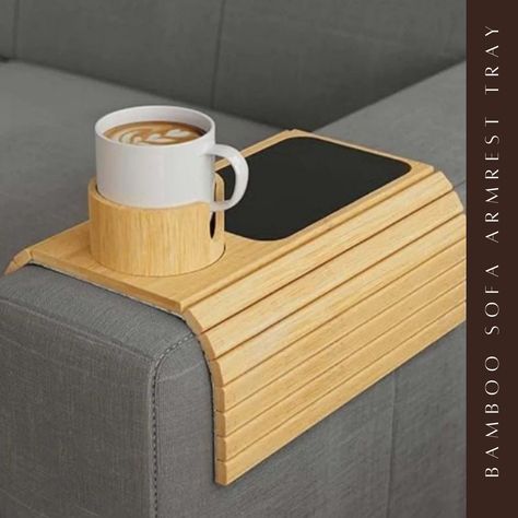 Ever wished your sofa arm was an efficient side table? Here you go! #lilpinsessentials #homedecor #bohodecor #lilpinsessentials #dailydeco #greenhomes #functional #modernhomes #environmental #loungevibes #housewares #stayhome #relaxationmode #thehomestyle #tranquility #qualityhome #restful #renewables #sustainablelifestyle #interiorspaces #bamboocraft #livingspace #minimaldesign #naturalhome #interiorstyling #homedecor Check out our space-saving Modern Bamboo & Silicone Sofa Armrest Tray... Sofa Armrest, Bamboo Crafts, Sustainable Lifestyle, Natural Home, Minimal Design, Interior Spaces, Boho Decor, Space Saving, Interior Styling