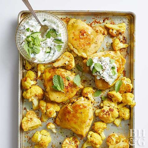 Roasted Curry Chicken and Cauliflower with Tzatziki Sauce (keto) - Greek yogurt, olive oil, curry powder, salt/pepper, chicken thighs, cauliflower, cucumber, garlic and mint (optional) Chicken And Cauliflower, Recipe Cauliflower, Chicken Cauliflower, Sheet Pan Suppers, Roasted Fennel, Roasted Chicken Thighs, Spicy Seasoning, Cauliflower Curry, Chicken Marinade