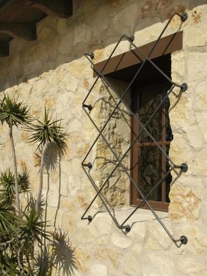 Spanish Mission Home Window Bars On Windows Security, Window Bars Security, Mexican Windows, Window Guards, Window Guard, Window Security Bars, Burglar Bars, Mission Style Homes, Basement Home Theater